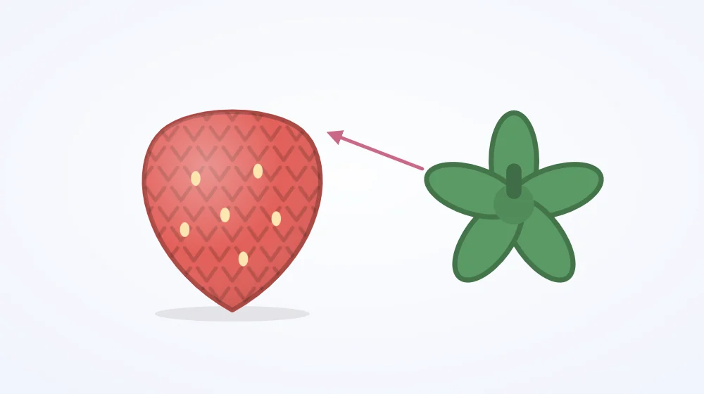 Red crocheted strawberry body with a separate green star-shaped leaf cap lying beside it